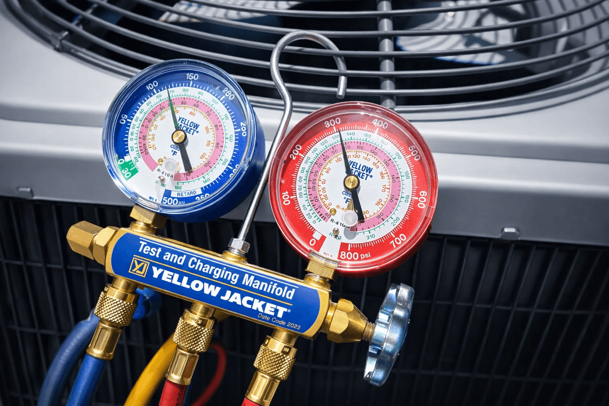 Yellow Jacket manifold gauges used for AC refrigerant diagnostics